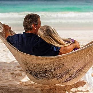 A couple enjoying the beach view